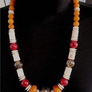 Elegant Beaded Necklace with Red and Orange Accents